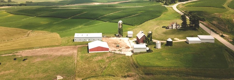 aerial view of a horse farm with horse fencing